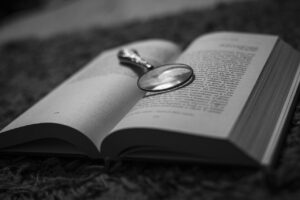 magnifying glass on a book